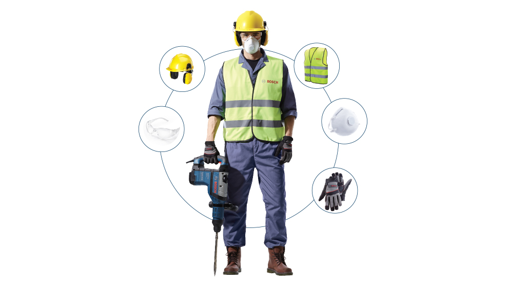 A worker with a Bosch hammer drill, yellow helmet, safety vest, and gloves.