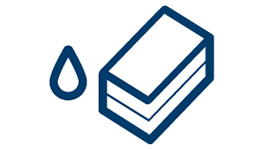 A blue sponge with a water droplet next to it.