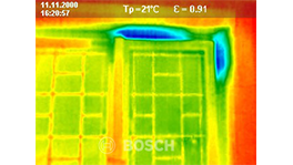 Thermographic image of a window with temperature differences.