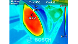 Thermographic image shows a red heat source at 32.7 °C.