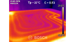A thermal image shows temperature gradients in purple and orange.