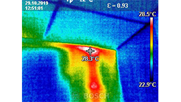 Thermal image with color gradient from Bosch, temperature display 28.3°C.